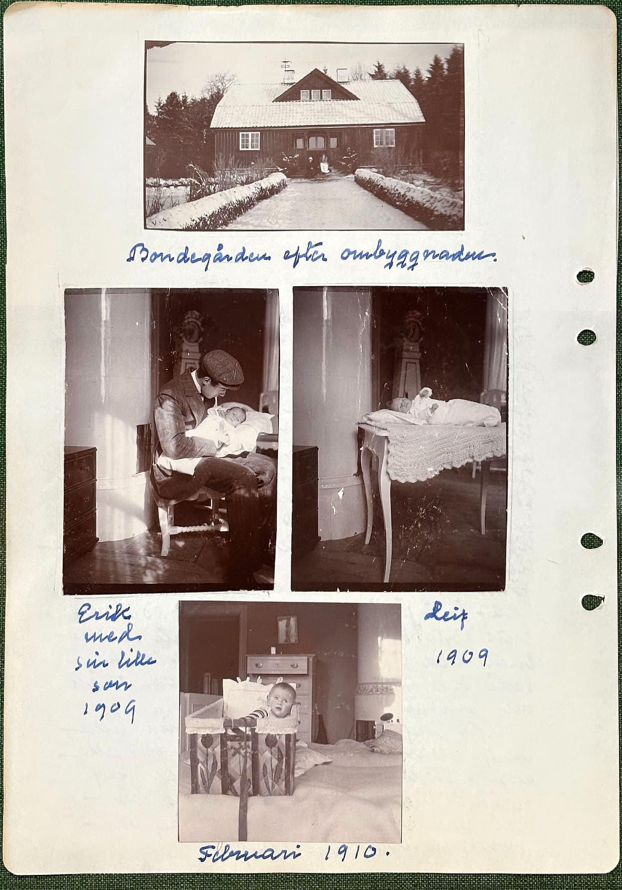 Fotograferad dagbokssida 164. Foto av ett timrat hus i vinterlandskap med snö på taket. Bildtext: 'Bondegården efter ombyggnaden.'. Foto av en man som lutar sig över ett spädbarn i famnen. Bildtext till vänster: 'Erik med sin lille son 1909'. Foto av ett spädbarn på ett bord med virkad duk. Bildtext till höger: 'Leif 1909'. Foto av ett litet barn i en spjälsäng vid en kakelugn. Bildtext: 'Februari 1910.'.