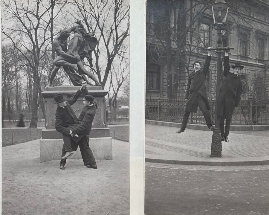 Erik Magnus och en annan chalmerist, fotograferade i en park och hängande i en gatlykta.